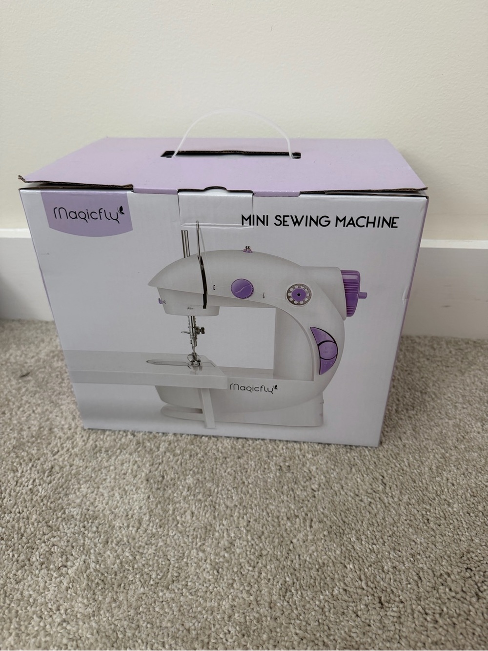 Brand new never used Magicfly Mini Sewing Machine in Light Purple